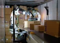 FedEx and Amazon Accelerate Robotic Arm Deployment Across Logistics Networks