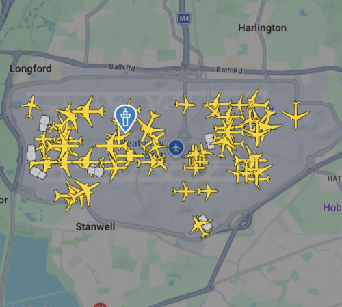 UK airport departure boards / passengers